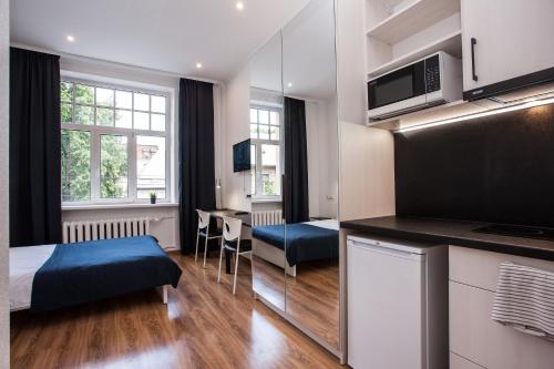 Køkken eller tekøkken på Gertrude's Residence