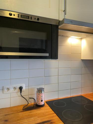 Кухня или кухненски бокс в Appartement privé avec vue