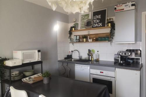 Köök või kööginurk majutusasutuses #AH5 Le Soleil des Jeux