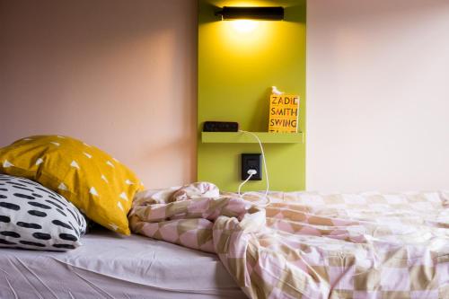 Tempat tidur dalam kamar di Hostel Ani&Haakien