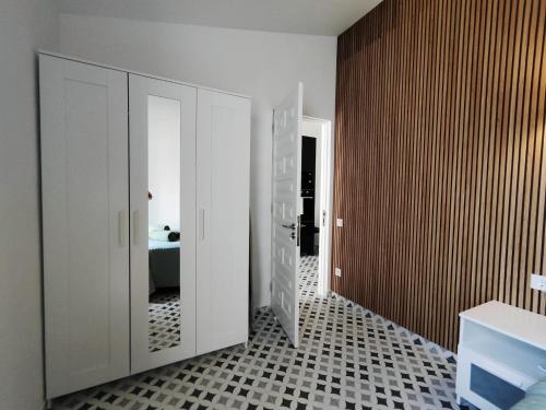 a bathroom with a sink and a toilet in a room at Bungalow BAHIA VERDE in Playa del Ingles