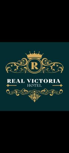 a logo for a real victoria hotel at Real Victoria in Ilo