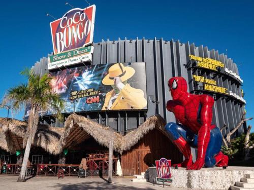 a restaurant with a spider man statue in front of it at sunrise-villa-at-vistacana in Punta Cana