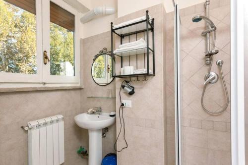 a bathroom with a sink and a shower at Vista sul Tevere in Rome