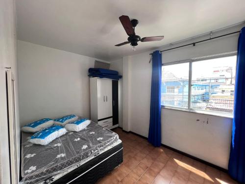 מיטה או מיטות בחדר ב-Apartamento 106