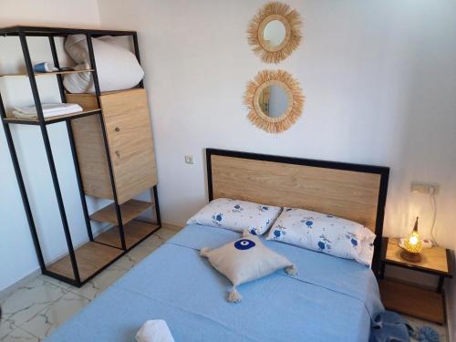 Una cama o camas en una habitación de Miramar Surf Anza