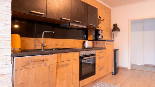 Kuchyň nebo kuchyňský kout v ubytování may-homestay-saar