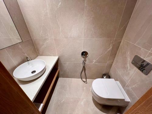 a bathroom with a toilet and a sink at RAJ zdravia in Bratislava