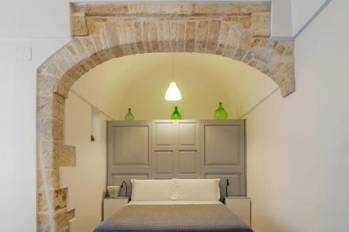 Ένα ή περισσότερα κρεβάτια σε δωμάτιο στο Murr Luxury Rooms