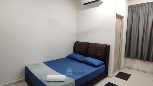 Katil atau katil-katil dalam bilik di Akasia Homestay Kuantan