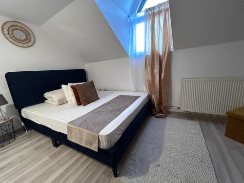 Posteľ alebo postele v izbe v ubytovaní Pensiunea Florina