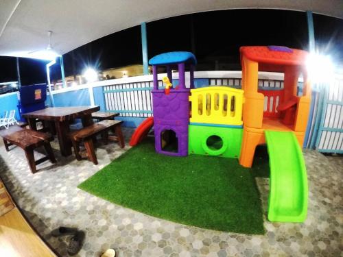 a childrens play area with a toy train at Blue house pool villa in Cha Am