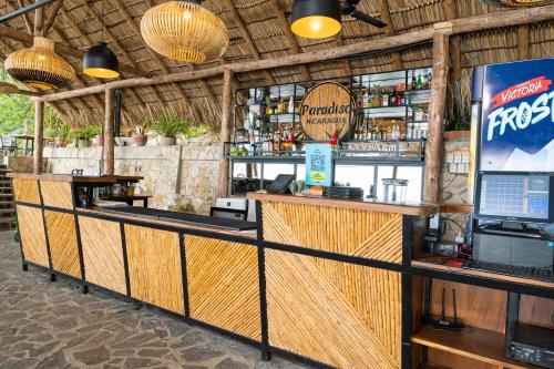 a bar inside of a restaurant with a counter at Paradiso Hostel in La Laguna