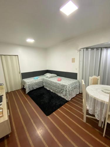 Llit o llits en una habitació de Ap Centro Foz do Iguaçu até 4 pessoas