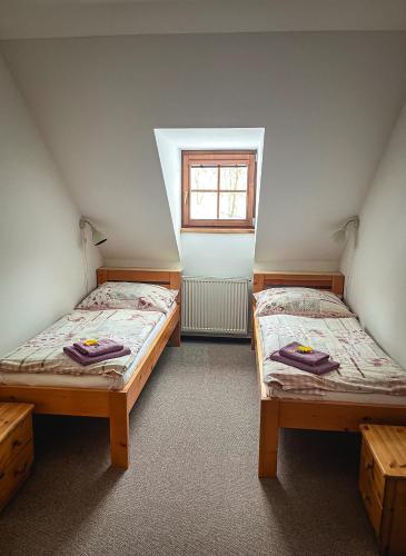 Cama o camas de una habitación en Penzion U Andresů
