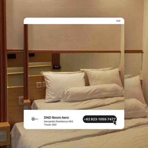 a picture of a bed in a room at DND Room Aero in Teko