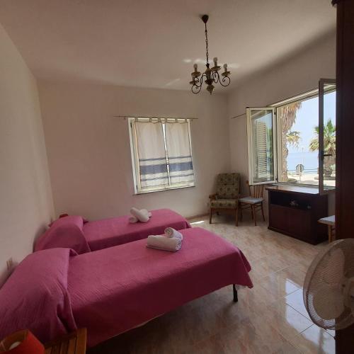 Una cama o camas en una habitación de Casa ponente...a due passi dal mare
