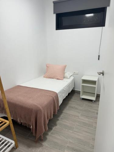 Ένα ή περισσότερα κρεβάτια σε δωμάτιο στο NAUZAYARA 6