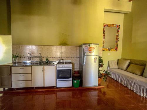 Una cocina o cocineta en Narciso Home