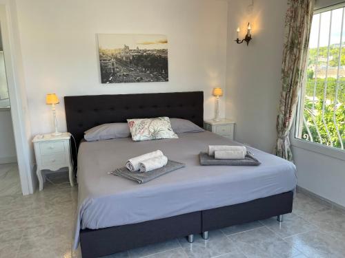 Postel nebo postele na pokoji v ubytování Villa mit privatem Pool 10 Minuten vom Strand mit kostenlosen WiFi