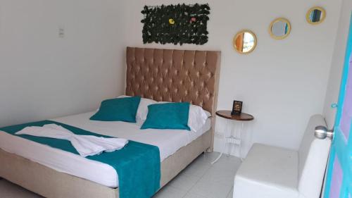 Кровать или кровати в номере MAGIA DEL MAR HOTEL - RESTAURANTE - BAR