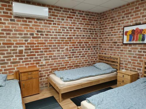 Posteľ alebo postele v izbe v ubytovaní Apartament „Sowa” jezioro 250m, góry