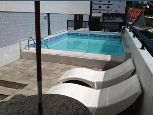 Bazén v ubytování Flat no melhor lugar de boa viagem nebo v jeho okolí