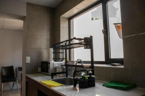 Kuchyň nebo kuchyňský kout v ubytování Hostel Las Pibas