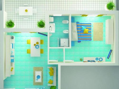 a model of a kitchen with blue tiles at Residence Abruzzo Resort in Tortoreto Lido