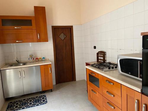 Kuchyň nebo kuchyňský kout v ubytování Vacanze siciliane