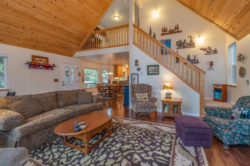 a living room with a couch and a table at The Mellow Moose in Dorrington