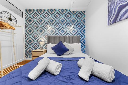 Ένα ή περισσότερα κρεβάτια σε δωμάτιο στο Modern One Bedroom Flat - Near Heathrow, Windsor Castle, Thorpe Park - Staines London TW18