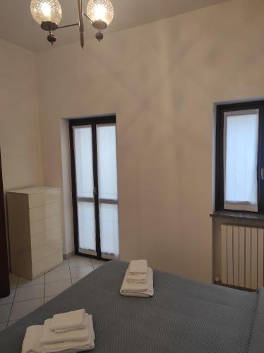 Кровать или кровати в номере Da Giovanni e Margherita