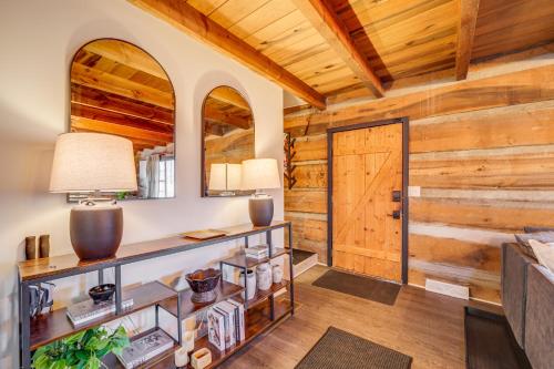 a room with wooden walls and a wooden door at Hot Tub, Game Room and Fire Pit Canton Log Cabin in Canton