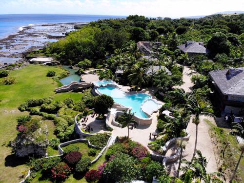 an aerial view of a resort with a swimming pool at Tanna Evergreen Resort & Tours in Tanna Island