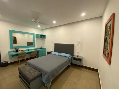 Voodi või voodid majutusasutuse HOSTAL LOS CEDROS toas