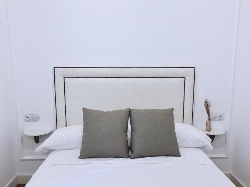 Een bed of bedden in een kamer bij Apartamento Los Burgueses