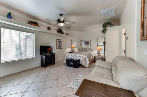 a living room with a couch and a bed at 4 Mi to San Tan Mtn Trails Arizona Studio! in Queen Creek