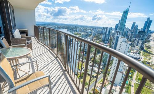 a balcony with a view of a city at Surfers Aquarius on the Beach in Gold Coast