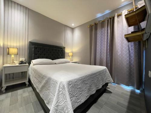 Cama o camas de una habitación en Hotel Paris Carré