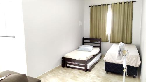 Postel nebo postele na pokoji v ubytování Casa de aluguel para temporada em Caldas Novas