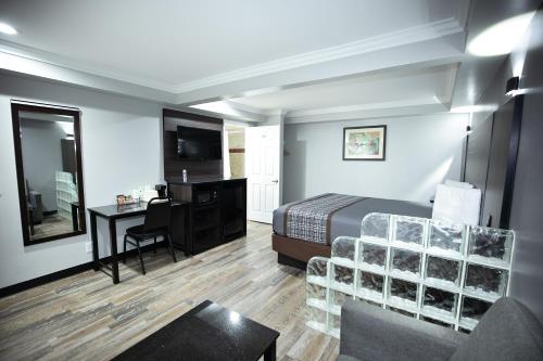 Area soggiorno di Rodeway Inn & Suites