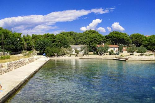 Secluded house with a swimming pool Kosljun, Pag - 22238