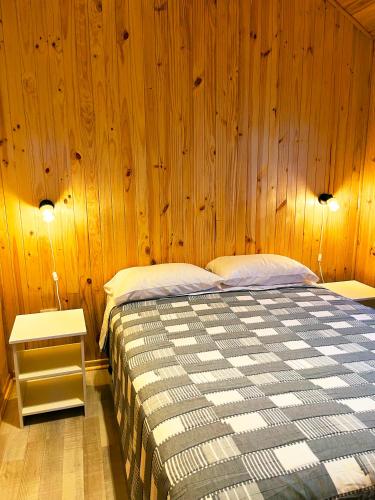 Cama o camas de una habitación en Cabañas Kalinaw