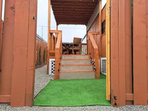 an open hallway with green grass on a house at Sunset Trailer Park RV #1 in El Suazal