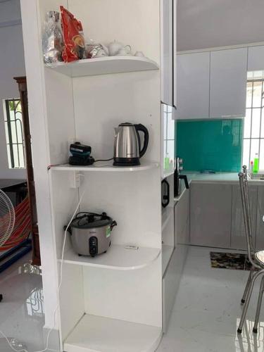 Η κουζίνα ή μικρή κουζίνα στο The Grand Coco Homestay