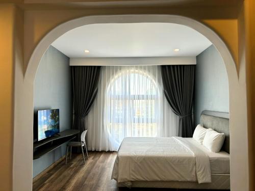 Ένα ή περισσότερα κρεβάτια σε δωμάτιο στο Hafi Boutique Hotel