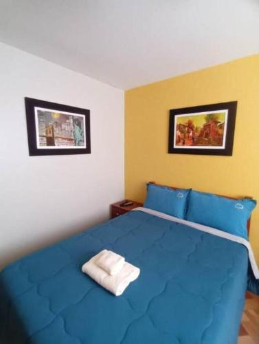 Łóżko lub łóżka w pokoju w obiekcie Close to Airport - Free One Time Pickup - A y J Familia