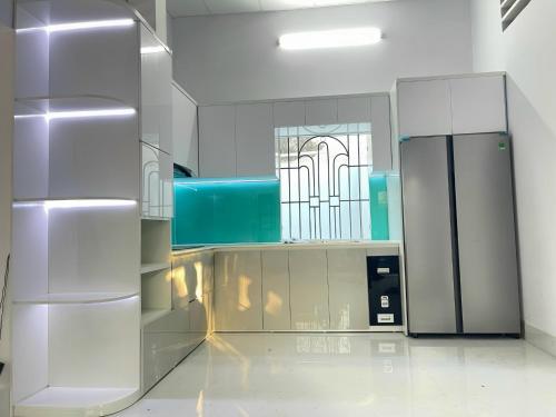 Η κουζίνα ή μικρή κουζίνα στο The Grand Coco Homestay
