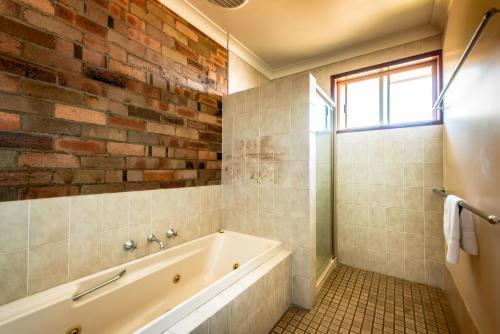 Ванная комната в Park Beach Resort Motel